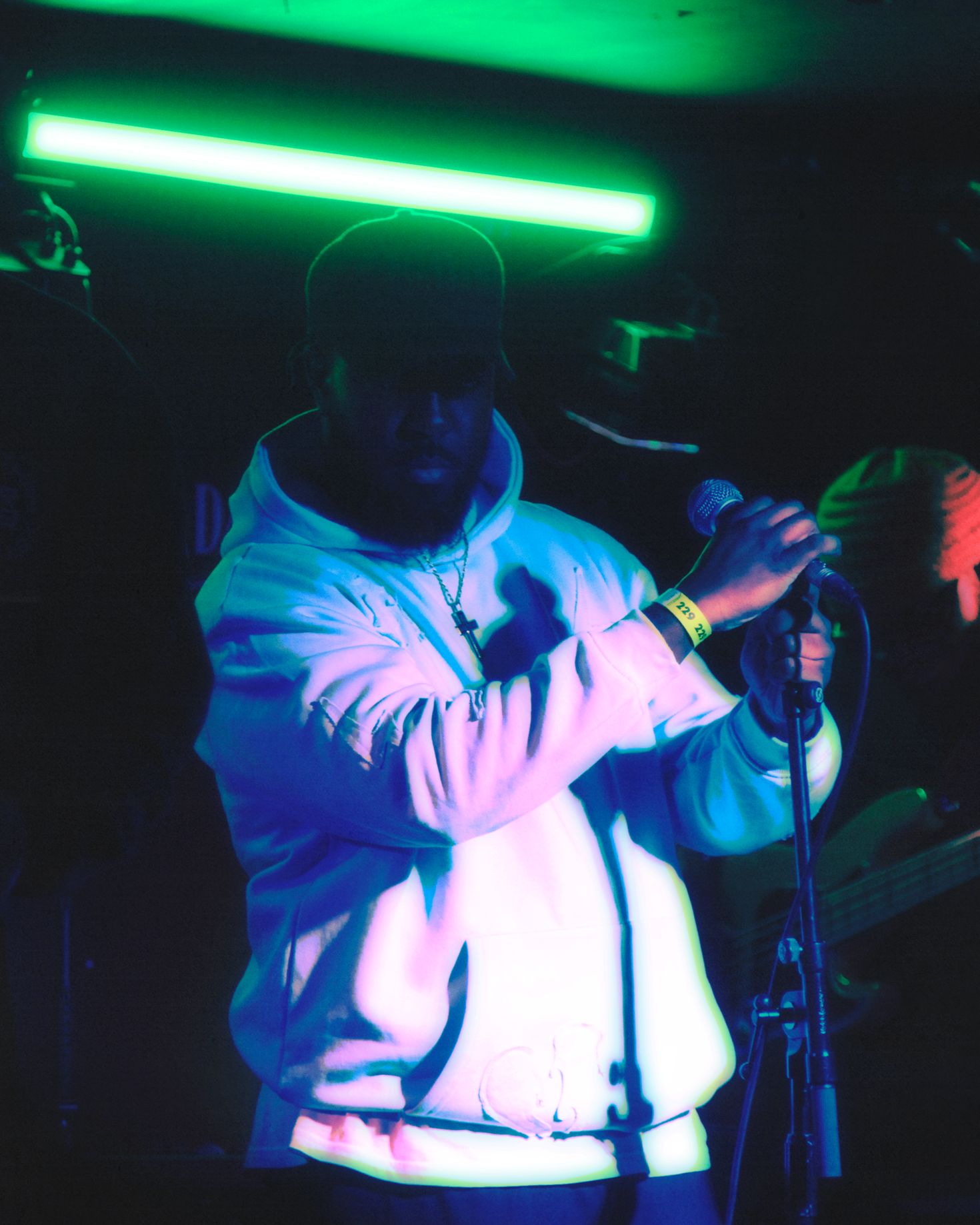Ashley Zeal performing live on stage.