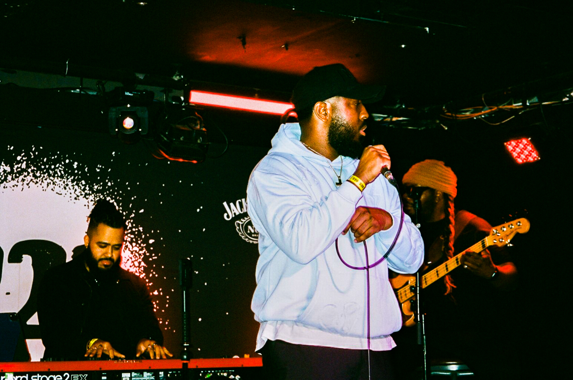 Ashley Zeal performing live on stage.