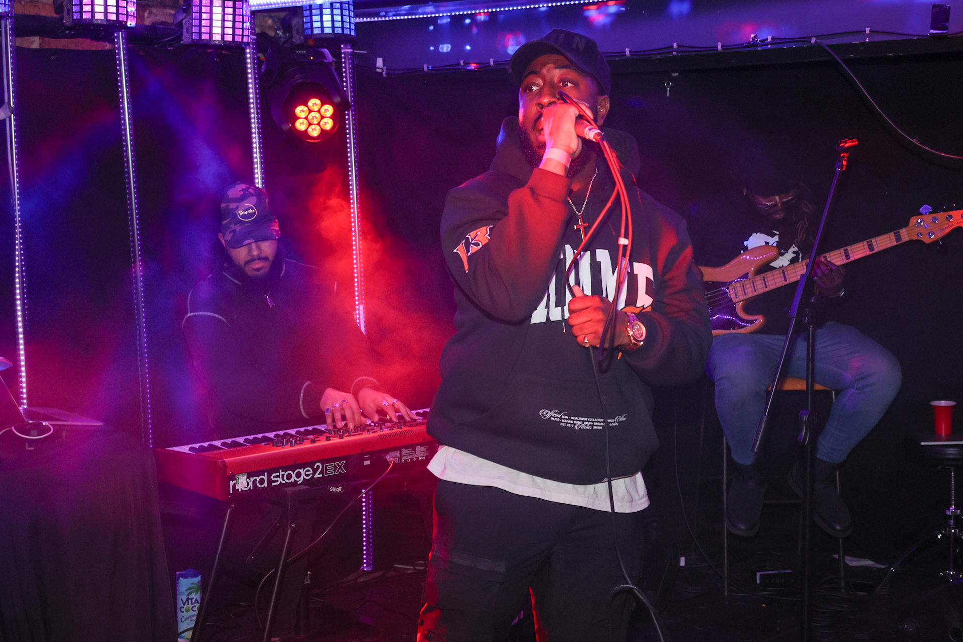 Ashley Zeal performing live on stage.