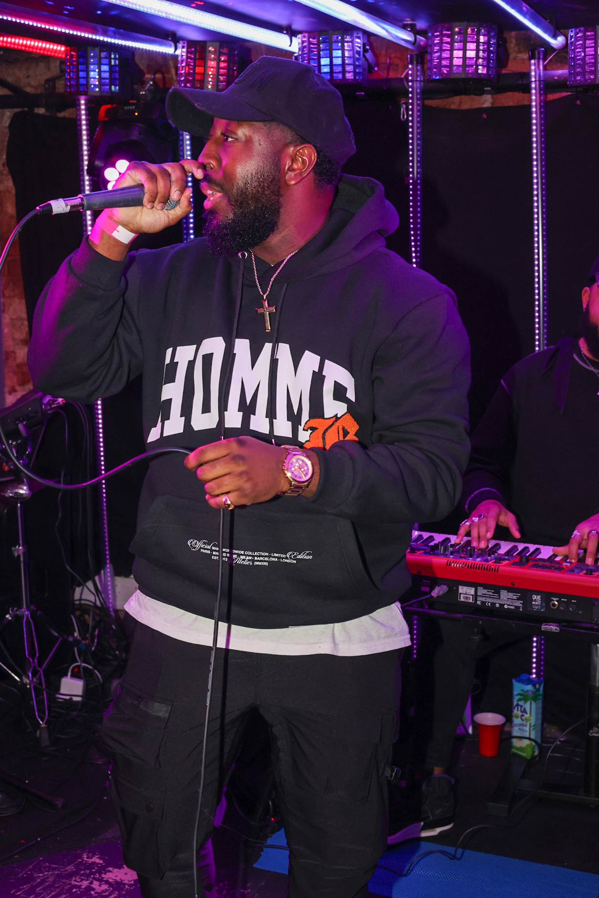 Ashley Zeal performing live on stage.
